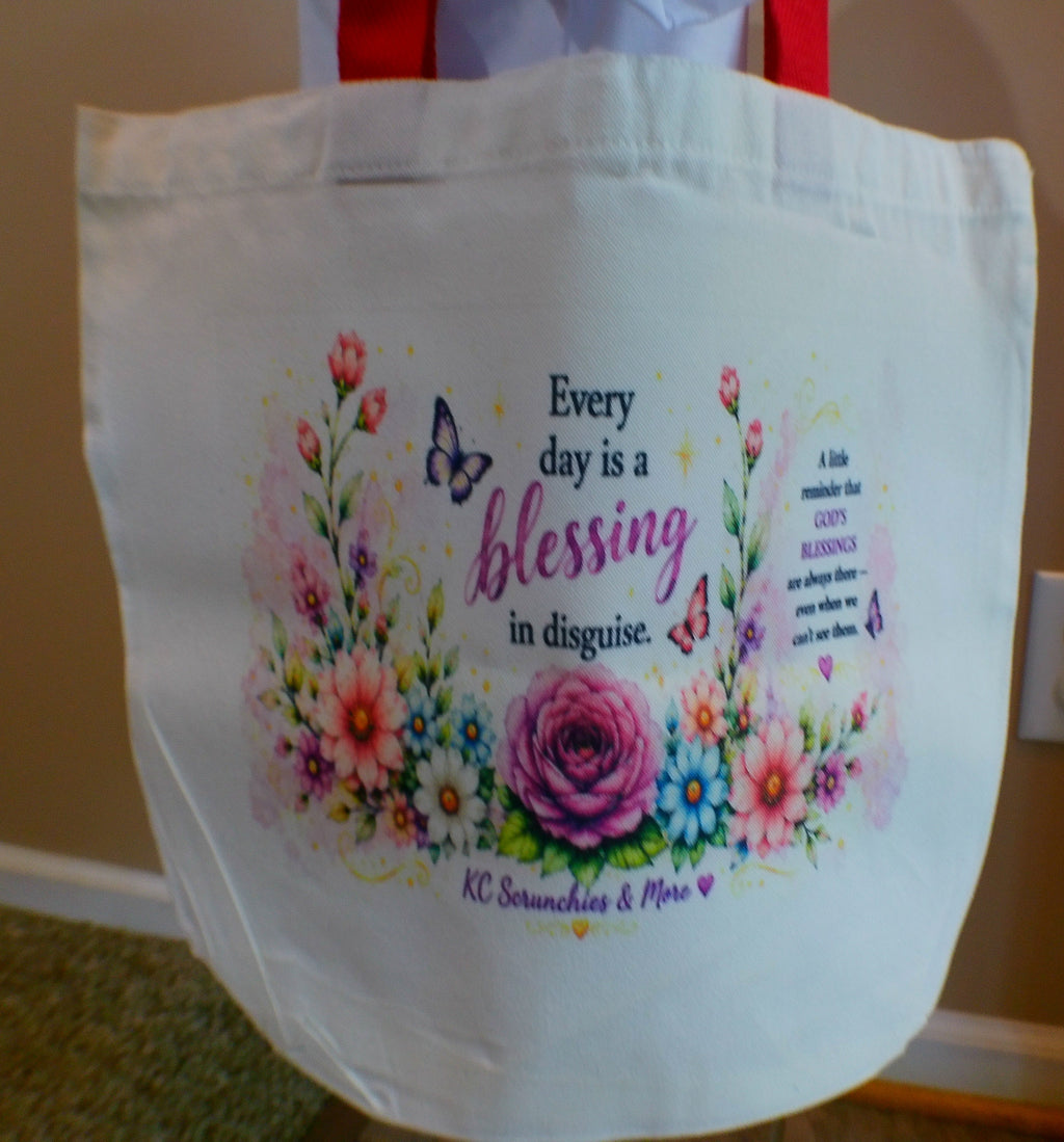 Front view of white canvas tote bag with Every Day is a Blessing design