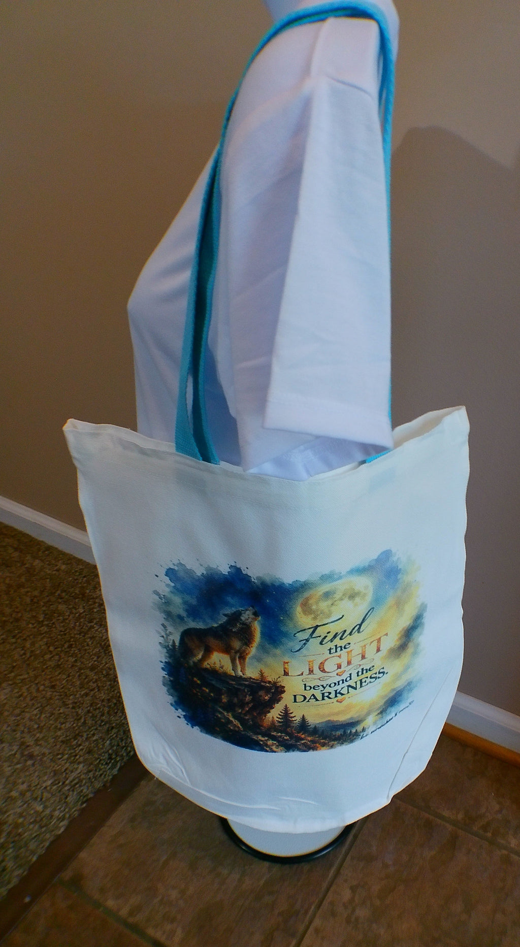 White canvas tote bag with Find the Light Beyond the Darkness wolf and moon design