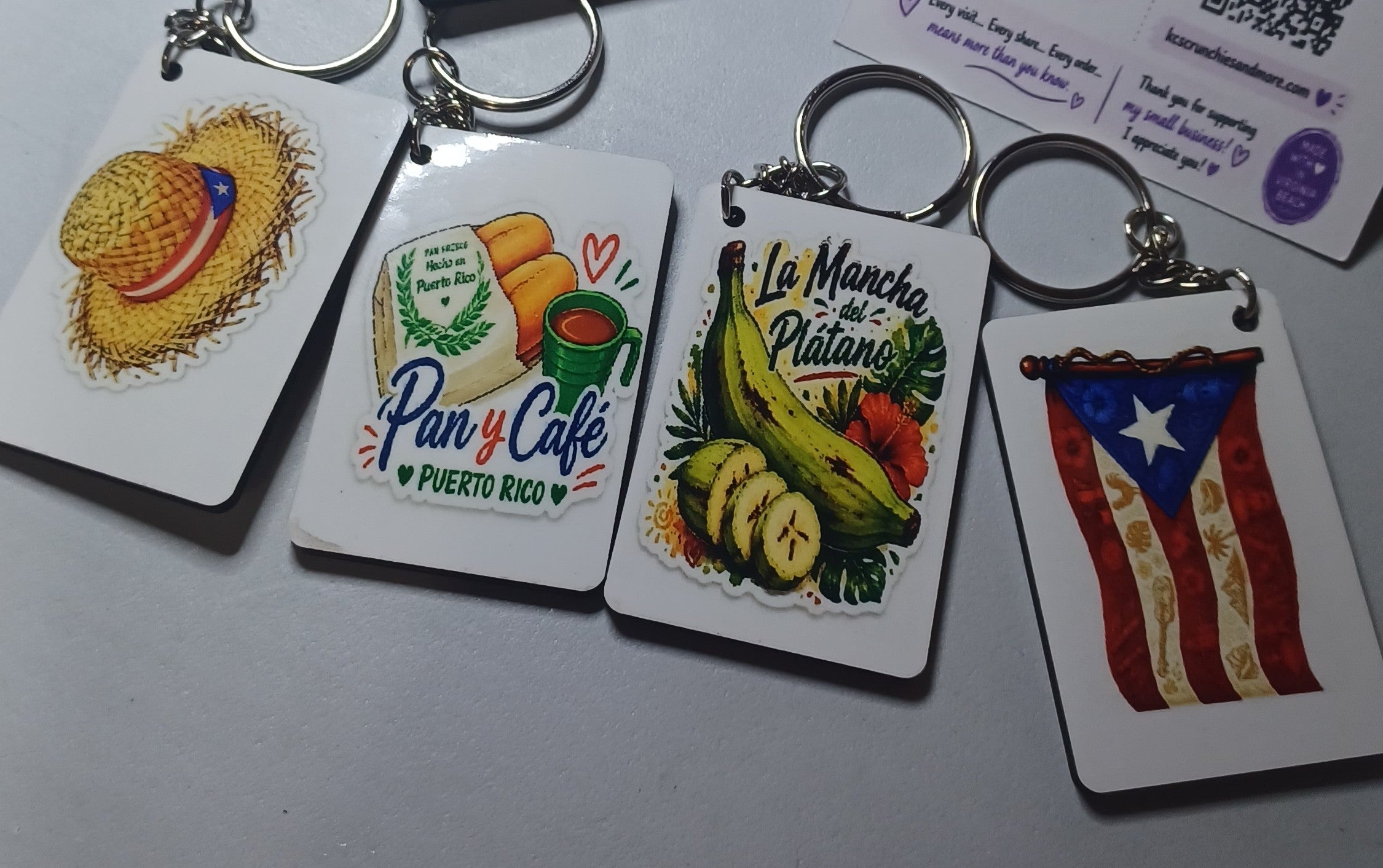 Boricua keychains lifestyle shot - all designs on display